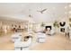 Expansive living room boasting high ceilings, modern furnishings, and an open-concept layout at 26631 E Arbor Dr, Aurora, CO 80016