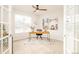 Inviting office space with a large window, a modern desk, and tasteful decorations at 26631 E Arbor Dr, Aurora, CO 80016