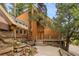 Beautiful exterior showcasing the home's architecture and the well-manicured landscaping at 5425 Us Highway 285, Morrison, CO 80465