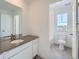 Clean bathroom with double vanity and shower/tub combo at 4620 Thistle Dr, Brighton, CO 80601