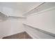 Spacious walk-in closet with ample shelving and hanging space at 4620 Thistle Dr, Brighton, CO 80601