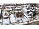 Snow covered home with a charming yard, viewed from above at 5035 W 32Nd Ave, Denver, CO 80212