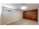 Spacious basement room, carpeted, with ample closet space at 5035 W 32Nd Ave, Denver, CO 80212