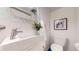 Basement bathroom with pedestal sink and shower at 5035 W 32Nd Ave, Denver, CO 80212