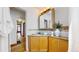 Bathroom with granite vanity and tiled shower at 5035 W 32Nd Ave, Denver, CO 80212