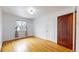 Bright bedroom with hardwood floors and ample closet space at 5035 W 32Nd Ave, Denver, CO 80212