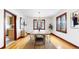 Elegant dining room with hardwood floors, chandelier, and built-in cabinetry at 5035 W 32Nd Ave, Denver, CO 80212