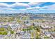 Stunning aerial view captures the city skyline with a sports stadium and surrounding urban landscape at 1800 Grove St, Denver, CO 80204