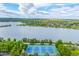 Scenic aerial view of Sloan's Lake, surrounding neighborhoods, and tennis courts at 1800 Grove St, Denver, CO 80204