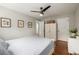 Spacious bedroom featuring hardwood floors, closet and a ceiling fan at 1800 Grove St, Denver, CO 80204