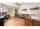 Cozy living room with hardwood floors, ceiling fan, and a leather sofa at 1800 Grove St, Denver, CO 80204
