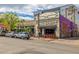 Street view of Head St. Provisions surrounded by other businesses on a sunny day at 1800 Grove St, Denver, CO 80204