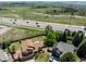 A beautiful neighborhood with lush greenery and a two-story house with a well-maintained lawn at 3968 Ashcroft Ave, Castle Rock, CO 80104
