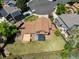 A bird's-eye view of a house in a cul-de-sac, featuring a spacious backyard, deck and lush greenery at 3968 Ashcroft Ave, Castle Rock, CO 80104