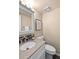 Bathroom with a speckled granite countertop, an oval sink, neutral walls and a toilet at 3968 Ashcroft Ave, Castle Rock, CO 80104