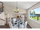 Open-concept dining area that shows access to living room at 3968 Ashcroft Ave, Castle Rock, CO 80104