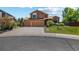 Inviting two-story home featuring a well-maintained lawn and a spacious two-car garage at 3968 Ashcroft Ave, Castle Rock, CO 80104