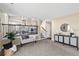 Open-concept space with view of kitchen, dining area, stairs and view of the living room seating area at 3968 Ashcroft Ave, Castle Rock, CO 80104