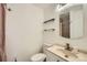 Bathroom featuring a vanity with a sink, a toilet, and an enclosed shower at 10064 Owens St, Broomfield, CO 80021