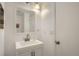 Clean bathroom with a white vanity, modern faucet, and a bright atmosphere at 10064 Owens St, Broomfield, CO 80021