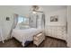 Bright bedroom with hardwood floors, a large window, and ample storage at 10064 Owens St, Broomfield, CO 80021