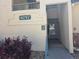 Condo entrance with a clear unit number and access to stairwell at 8757 E Dry Creek Rd # 1528, Englewood, CO 80112