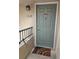 Charming front door with a 'No Soliciting' sign, house number 1528 and welcome mat at 8757 E Dry Creek Rd # 1528, Englewood, CO 80112