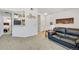 Comfortable living room with a plush black sofa and contemporary decor at 8757 E Dry Creek Rd # 1528, Englewood, CO 80112