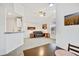 Inviting living area with vaulted ceilings and an open flow to the kitchen and dining at 8757 E Dry Creek Rd # 1528, Englewood, CO 80112