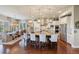 Spacious kitchen with a large island, stainless steel appliances, and a stylish dining area at 10601 Montecito Dr, Lone Tree, CO 80124