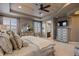 Large main bedroom boasts a vaulted ceiling, natural light, and an ensuite bathroom at 10601 Montecito Dr, Lone Tree, CO 80124