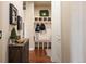 Functional mud room with built-in bench, storage, and coat hooks at 10601 Montecito Dr, Lone Tree, CO 80124
