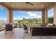 Outdoor patio with seating, scenic views and mountain views at 10601 Montecito Dr, Lone Tree, CO 80124