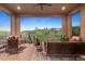 Inviting outdoor patio area with comfortable seating and views of the neighborhood at 10601 Montecito Dr, Lone Tree, CO 80124
