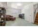Finished basement area with a sitting area and office space at 1492 S Dudley St, Lakewood, CO 80232