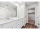 Ensuite bathroom with double sinks, shower and ample counter space at 2145 Flower Blossom Ave, Brighton, CO 80601