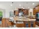 Spacious kitchen with granite countertops, stainless steel appliances, and custom cabinetry at 11302 E Ida Ct, Englewood, CO 80111