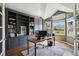 Spacious home office with custom built-ins and ample natural light at 11302 E Ida Ct, Englewood, CO 80111