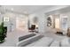 Bright basement living room with ample space and comfortable furnishings at 8188 S Yukon St, Littleton, CO 80128