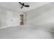 Bedroom featuring plush carpeting, ample lighting and a closet at 8188 S Yukon St, Littleton, CO 80128