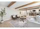 Spacious living room with hardwood floors and a modern design, creating a cozy ambiance at 8188 S Yukon St, Littleton, CO 80128