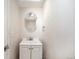Powder room featuring a modern vanity and fixtures at 12662 W Virginia Ave, Lakewood, CO 80228