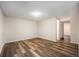 Comfortable bedroom with plenty of space, hardwood floors, neutral paint, and good lighting at 12662 W Virginia Ave, Lakewood, CO 80228