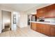 Spacious kitchen features tile flooring and an open design at 12662 W Virginia Ave, Lakewood, CO 80228