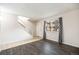 Bright living room featuring hardwood floors and a staircase to the upper level at 12662 W Virginia Ave, Lakewood, CO 80228