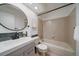 Updated bathroom with modern vanity, fixtures, and tile work, providing a fresh and stylish space at 8508 Vivian Ct, Arvada, CO 80005