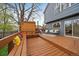 This back deck features outdoor seating, a patio rug, and direct access to the home at 8508 Vivian Ct, Arvada, CO 80005
