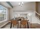 Charming dining area with modern furnishings and a view to the backyard creates an inviting space at 8508 Vivian Ct, Arvada, CO 80005
