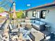 Outdoor deck featuring comfortable seating, a fire pit, and a stylish outdoor rug at 1528 Coronado Pkwy, Denver, CO 80229