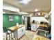 Functional kitchen with stainless steel appliances, butcher block countertops, and eat-in island at 1528 Coronado Pkwy, Denver, CO 80229